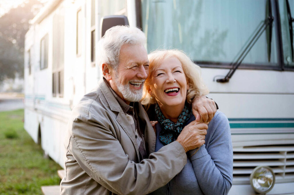 laughing senior couple with their arms around each other annuities for retirement houston tx
